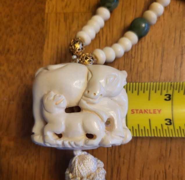 Vintage Ox & Calf Celluloid Netsuke Bead Tassel Necklace 22 Inches 5.5 Inch Drop