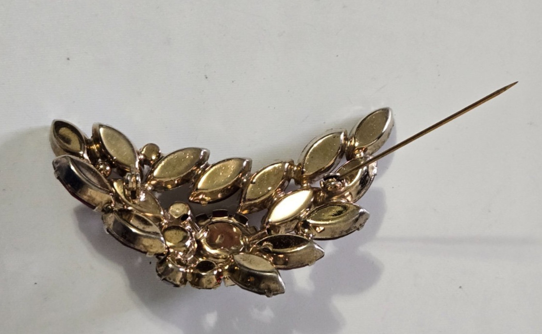 Vintage Brooch. Goldtone with Dark Red Stones. Pink Accent Stones. Gorgeous.