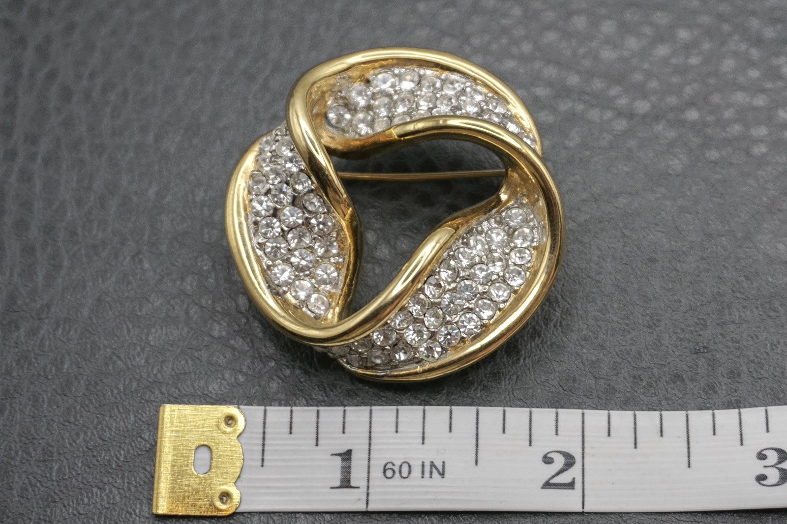 Vintage 80s Runway Gold Tone Brooch Pin Pave Clear Rhinestone Twist Ribbon
