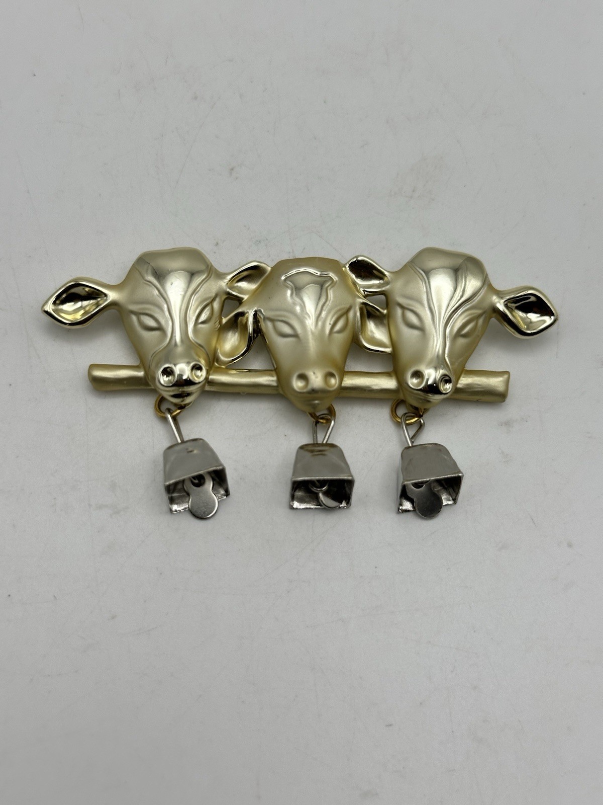 Vintage Gold Tone 3 Cow Brooch Pin with Dangling Silver Tone Bells Signed AJC