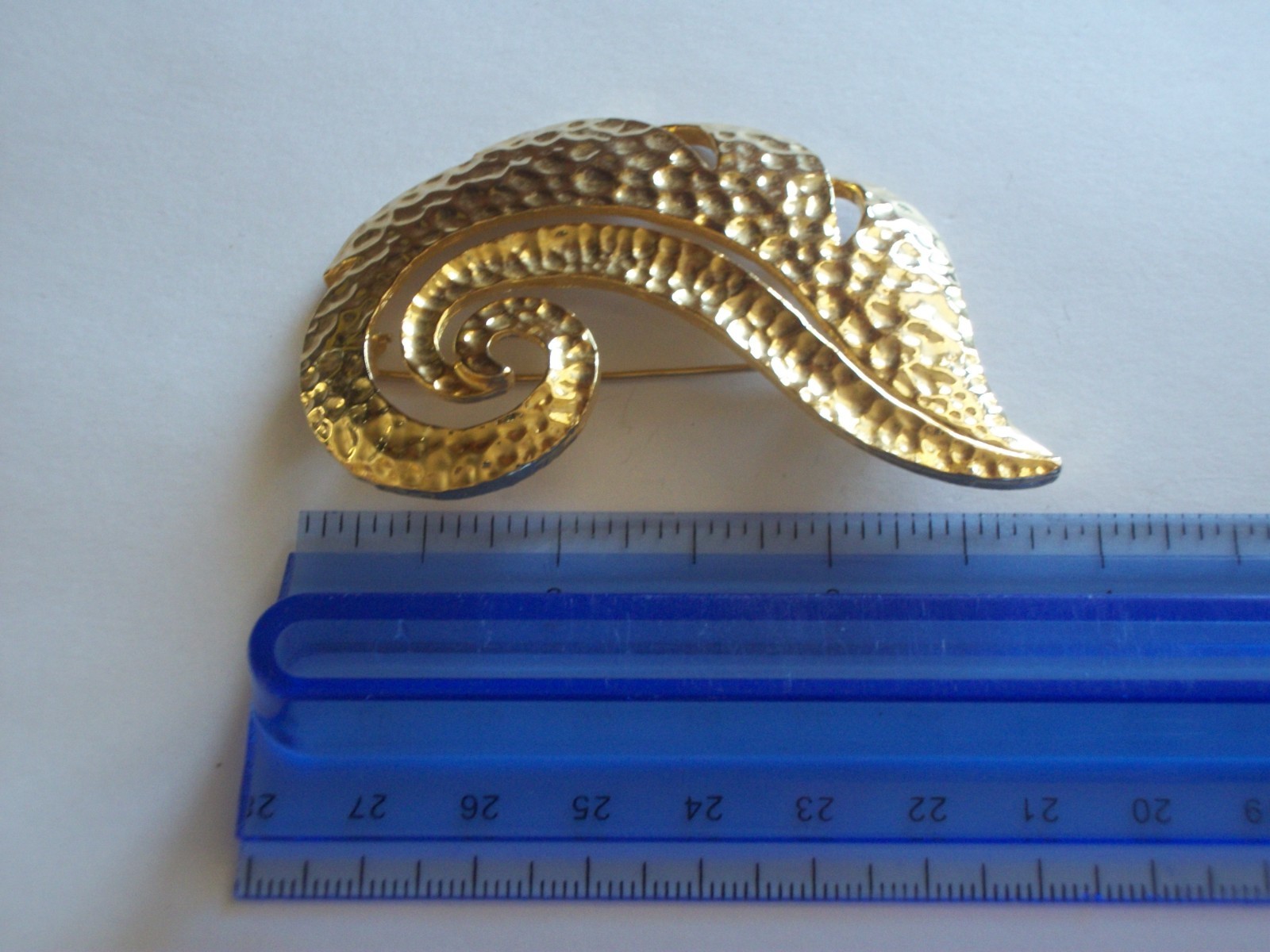 Hammered gold plated curled leaf
