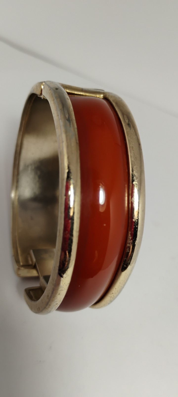 bergere goldtone hinge cuff bracelet inlaid w/soft redish brown material-nd6