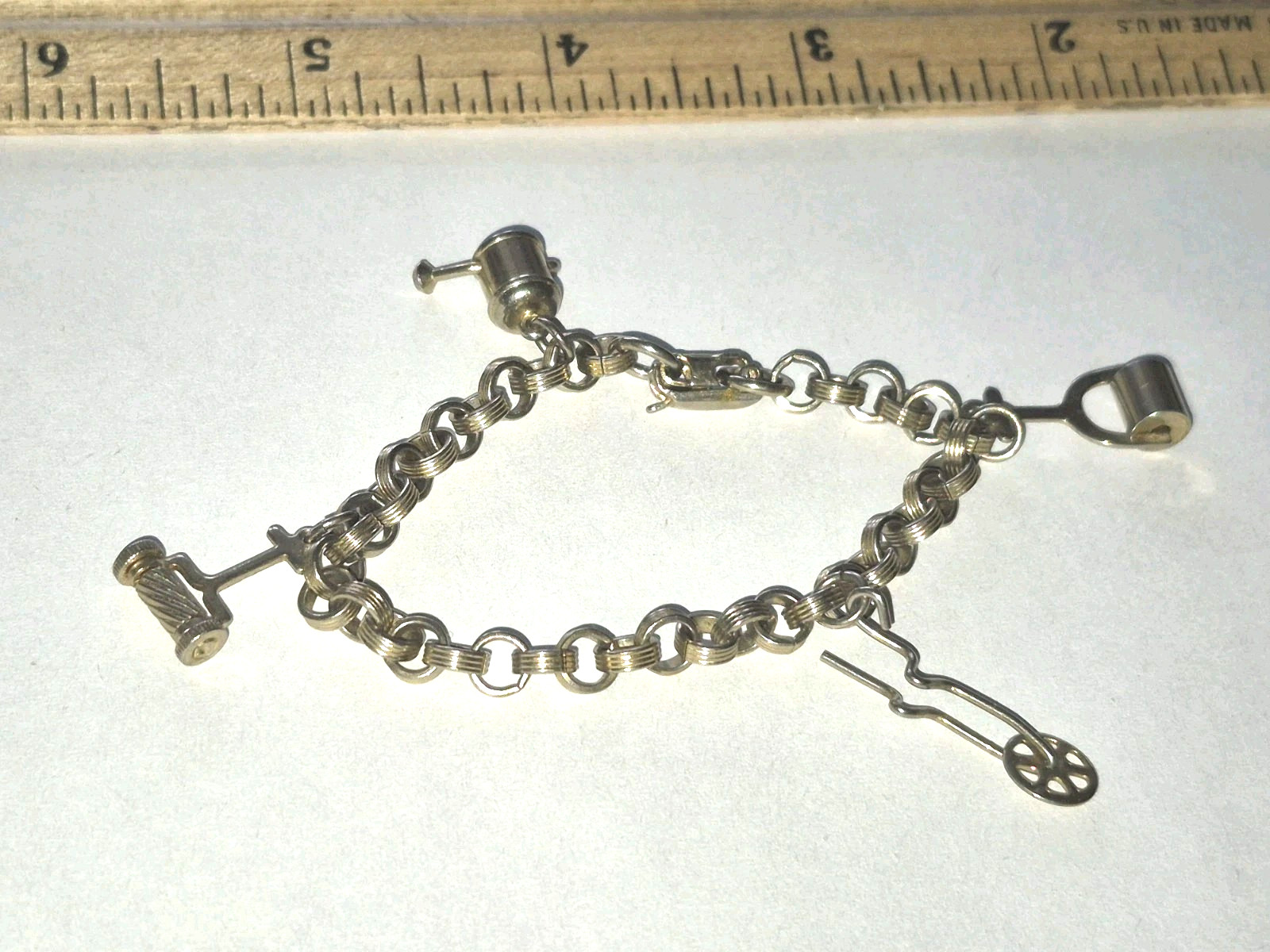 Vintage signed CORO with GARDEN moving Charms Bracelet costume jewelry