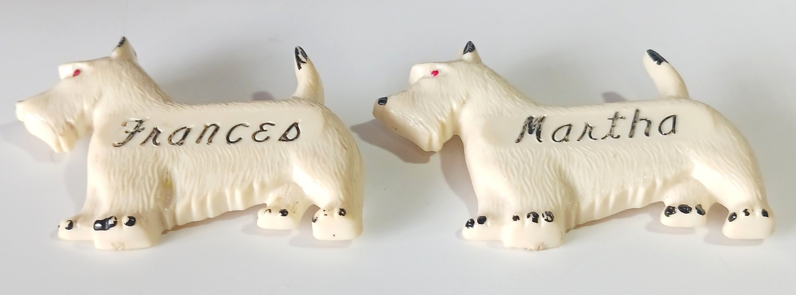 Pair of Vintage Off-White Celluloid Westie Dog Brooches: Frances & Martha