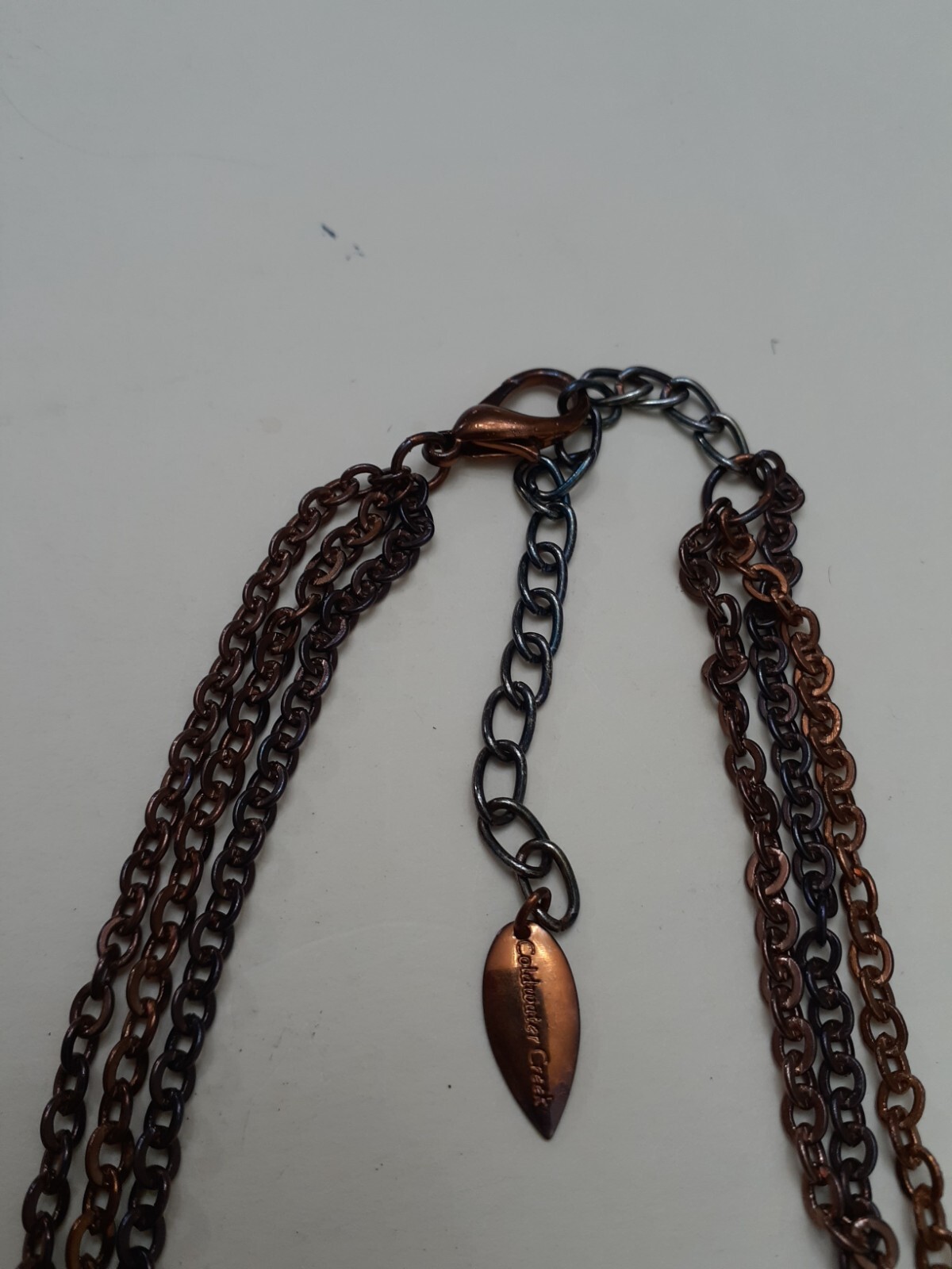 Coldwater Creek women long necklace all metal chains with tiny beads. NWOT.