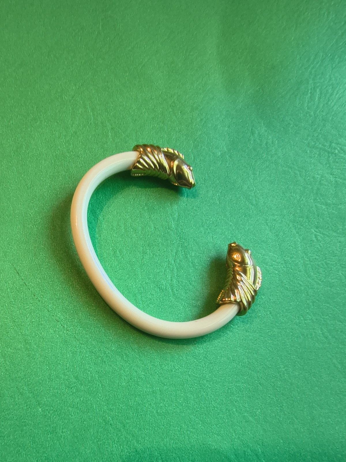 Signed Monet vintage bracelet with a bright gold-tone finish.