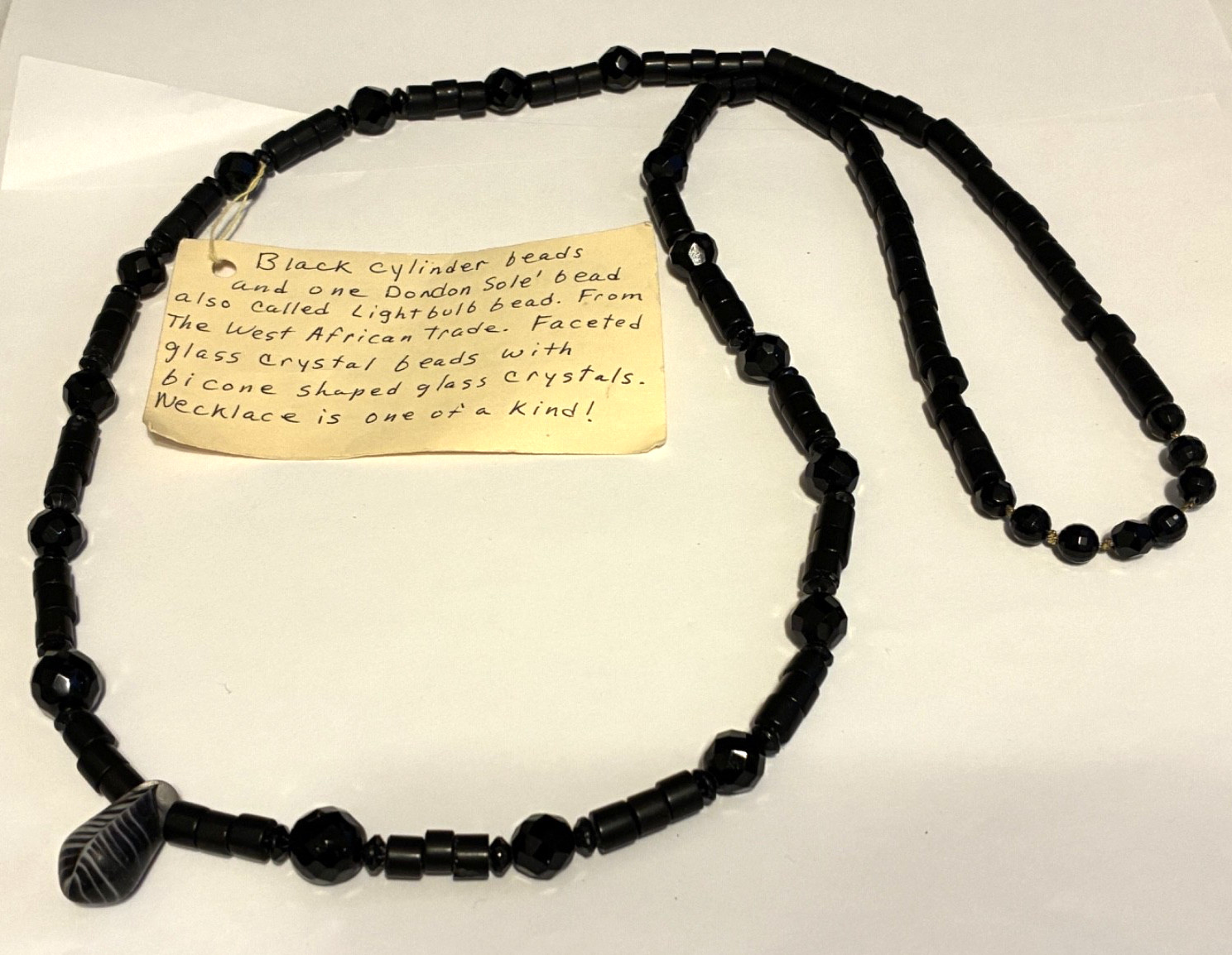 VTG Necklace 34″ Faceted Black Crystal Beads and W. African Trade Dondon Sole