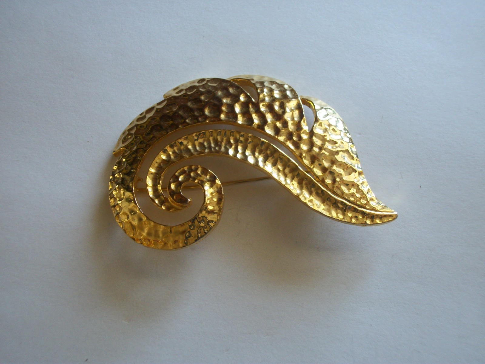 Hammered gold plated curled leaf