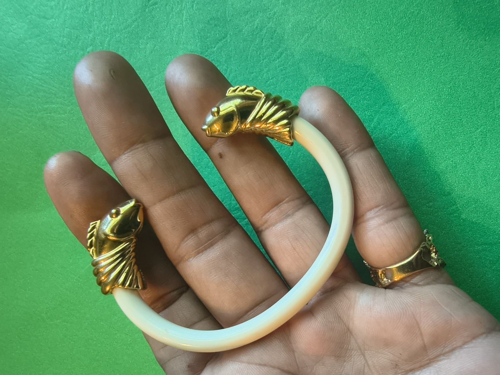 Signed Monet vintage bracelet with a bright gold-tone finish.