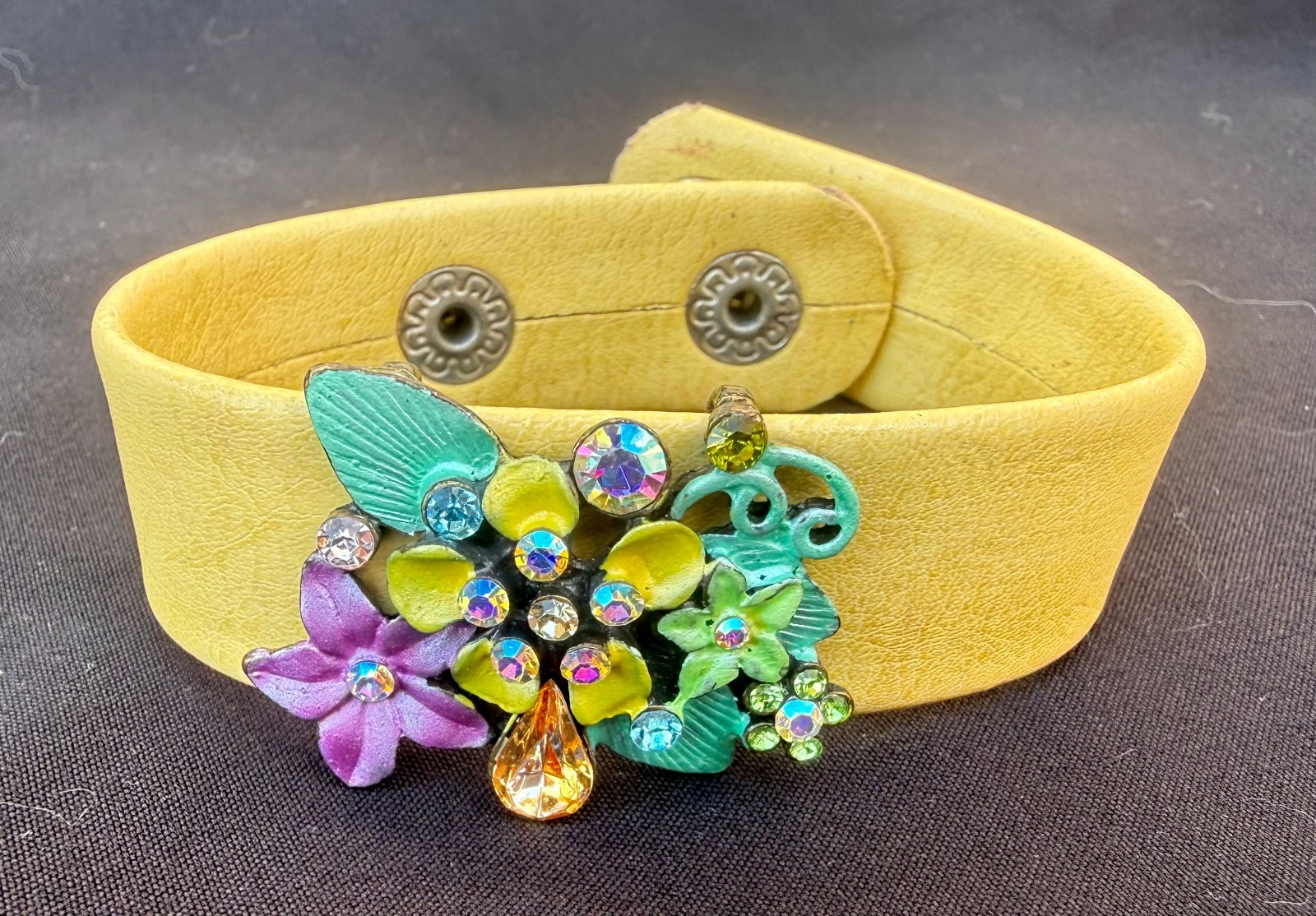 Vintage Yellow Leather Snap Cuff Band with enamel and rhinestone floral cluster
