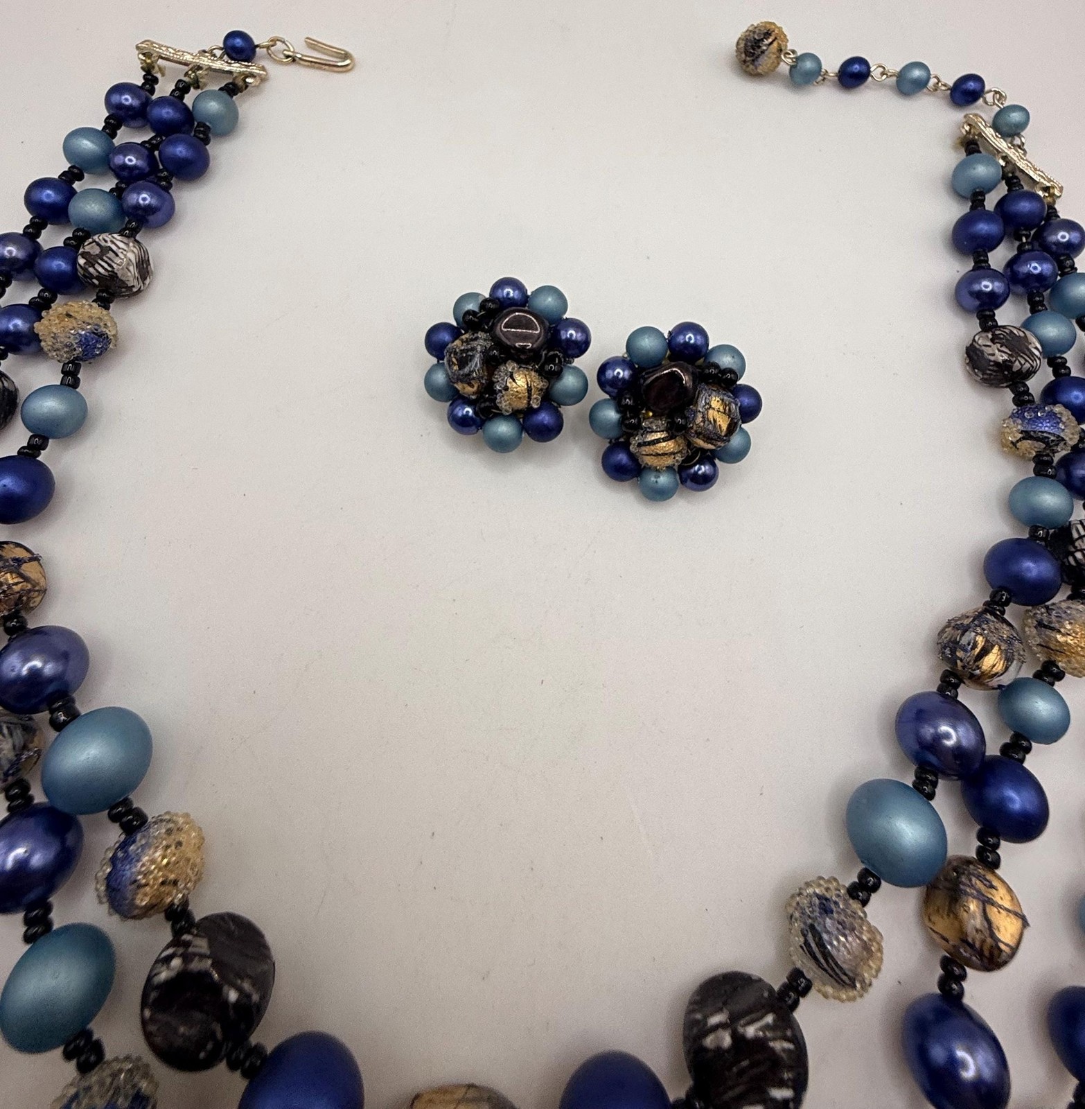 Vintage blue and gold two strand necklace and clip on earring set