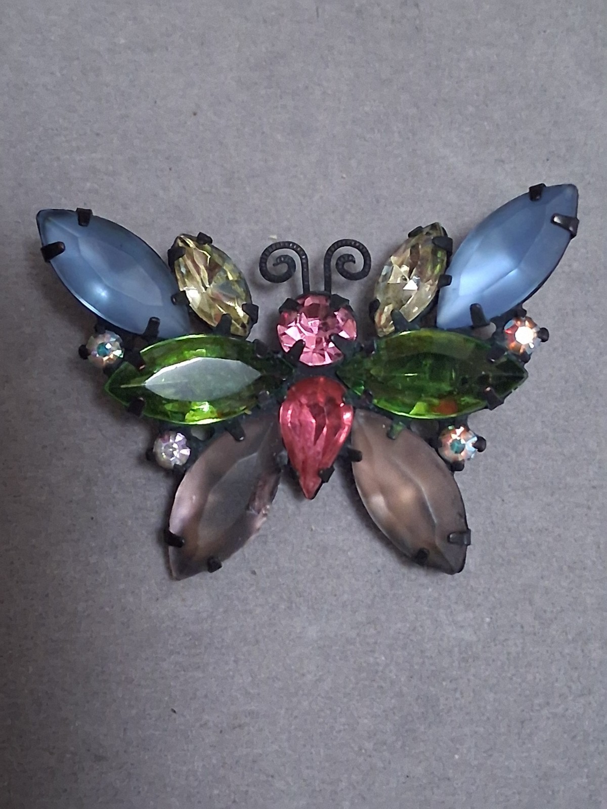 Vintage Juliana butterfly brooch multi color & shape prong set stones