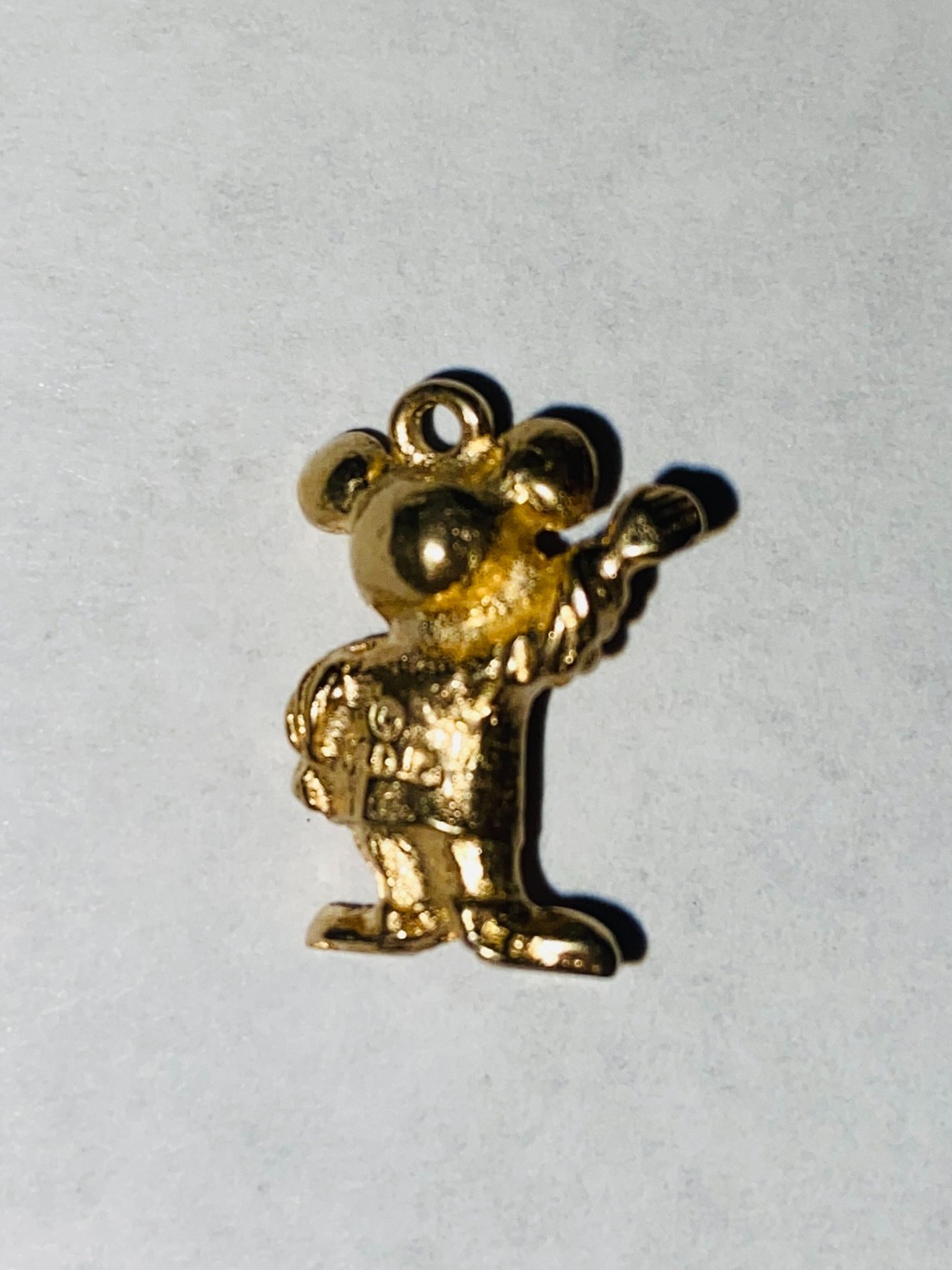 Vintage mid-century 14k yellow gold Disney charm/pendant features Micky Mouse