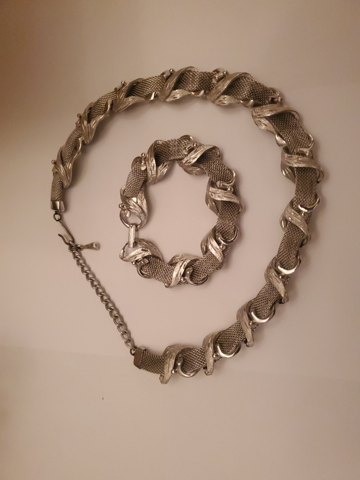 Vintage Coro Silvertone Set Features A Textured Ribbon Design And Includes Both