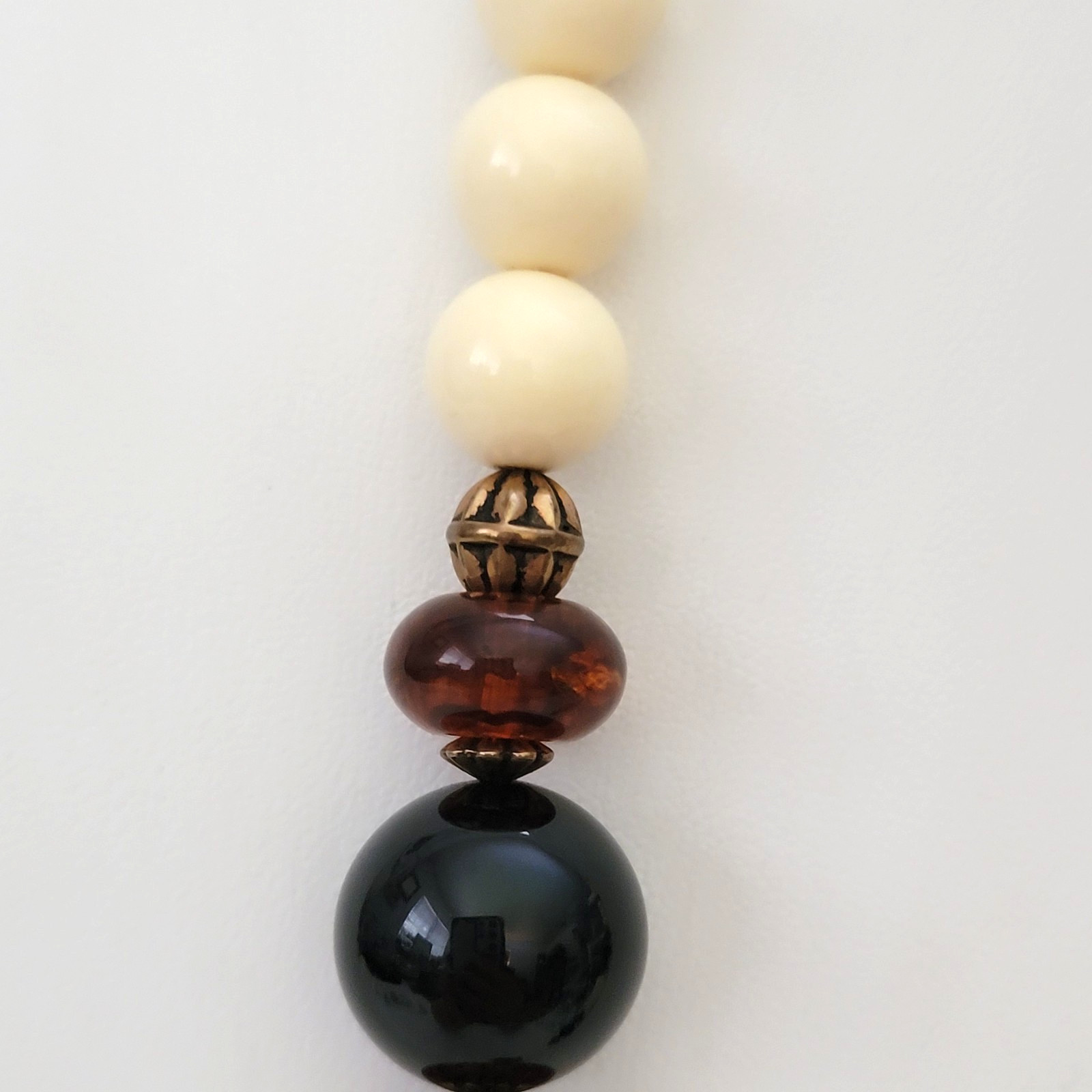 Vintage Black, Amber & Ivory Tone Lucite Resin Beaded Necklace 30″ L – 12mm
