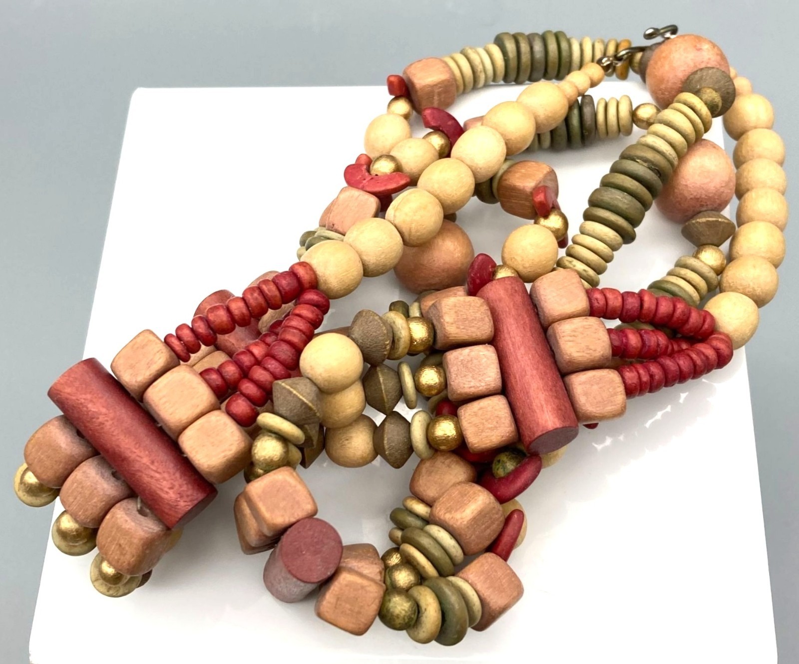 Muted Multi Strand Drape Necklace with Boho Wood Beads in Different Shapes and S