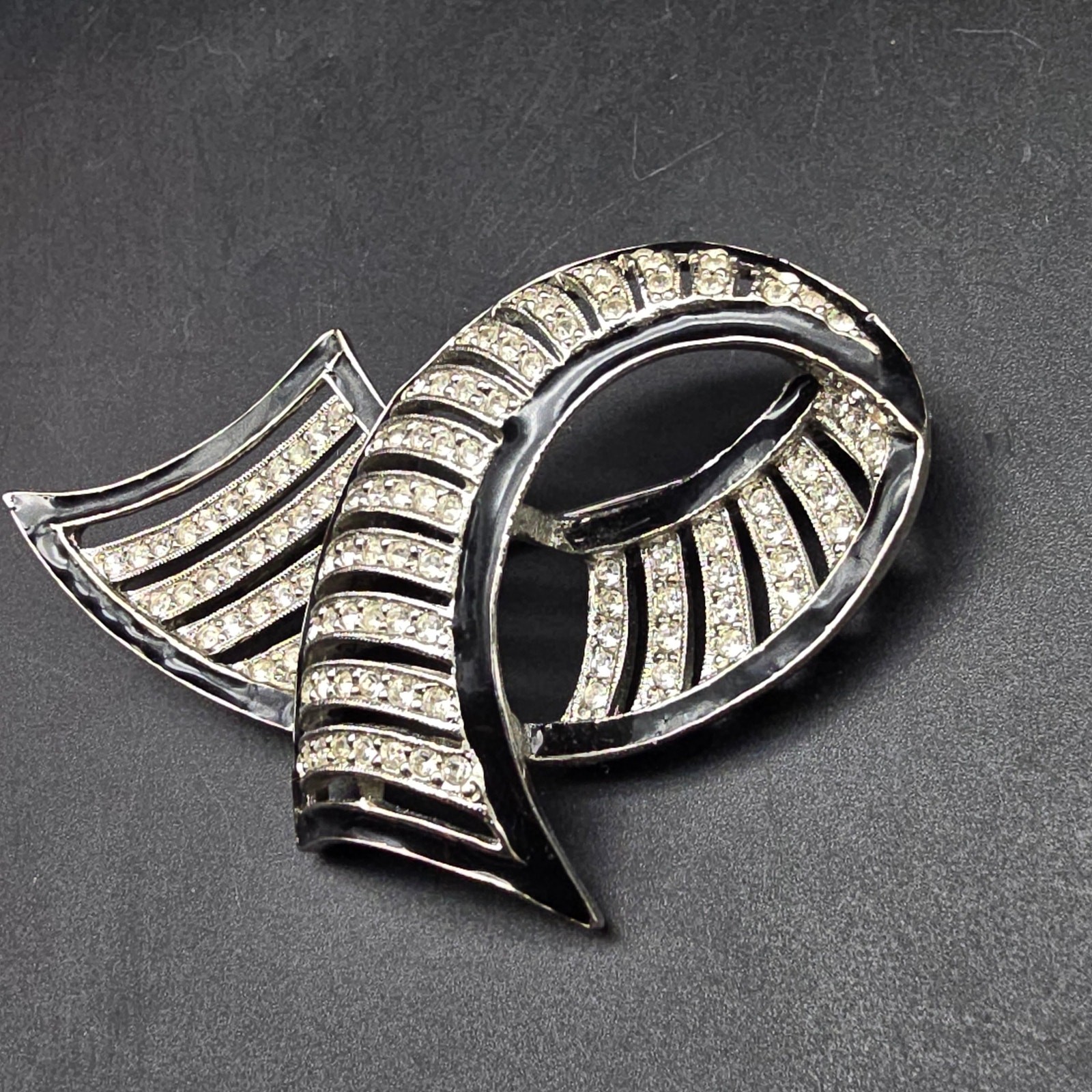 Les Bernard Swirl Ribbon Rhinestone Brooch Black Enamel Silver Tone