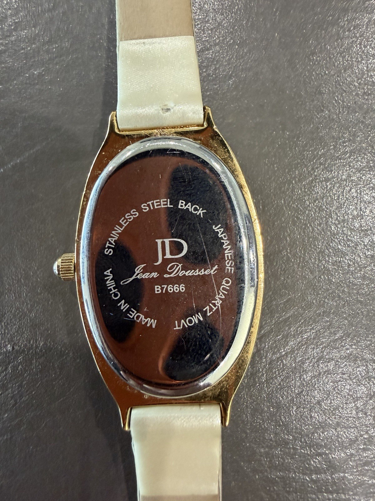 Vintage Jean Dousset Leather, Rhinestone Watch With Beige oval face.