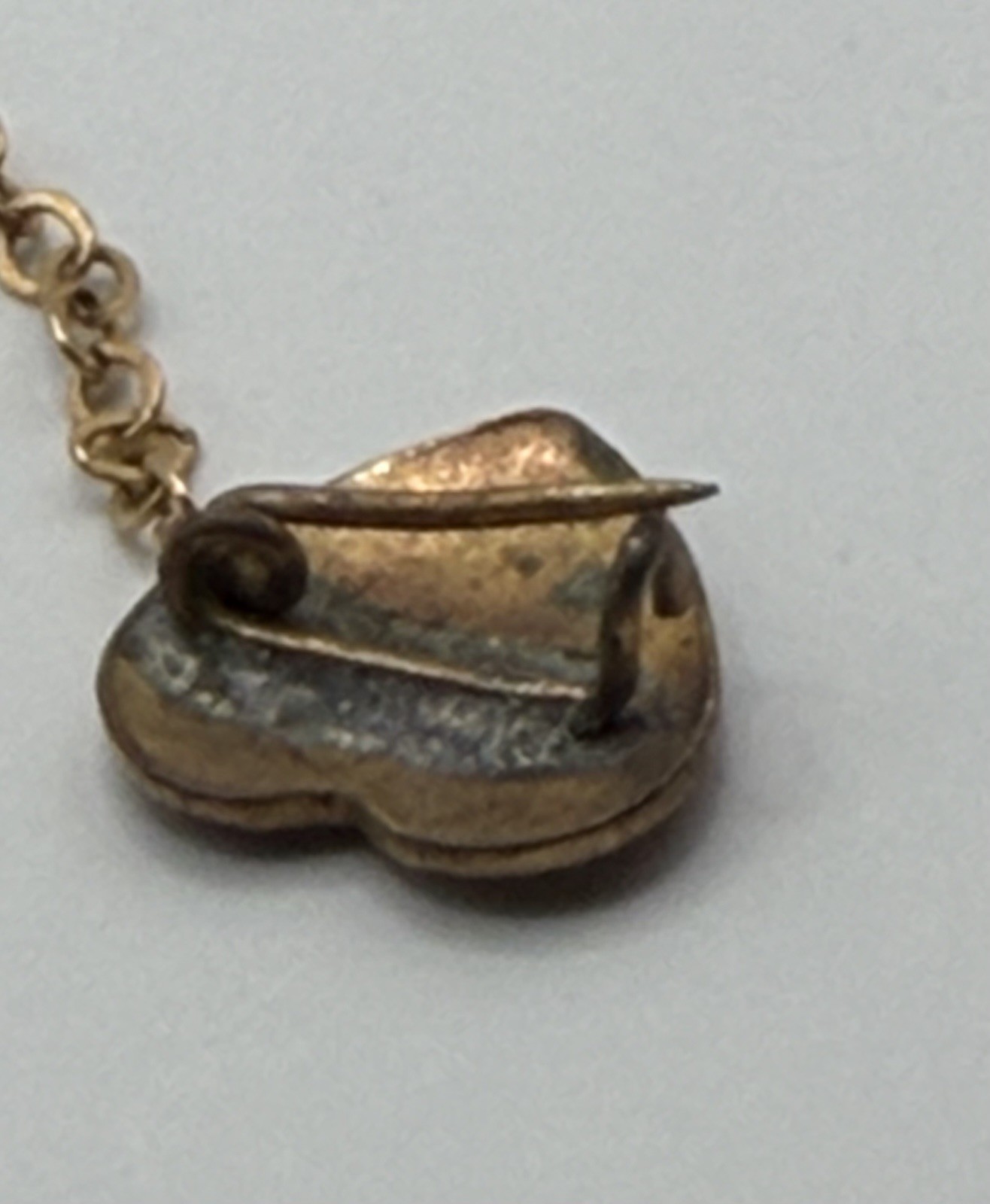 Antique Victorian Brass Hand Holding a Dangling Engraved Mini Heart Pin Brooch