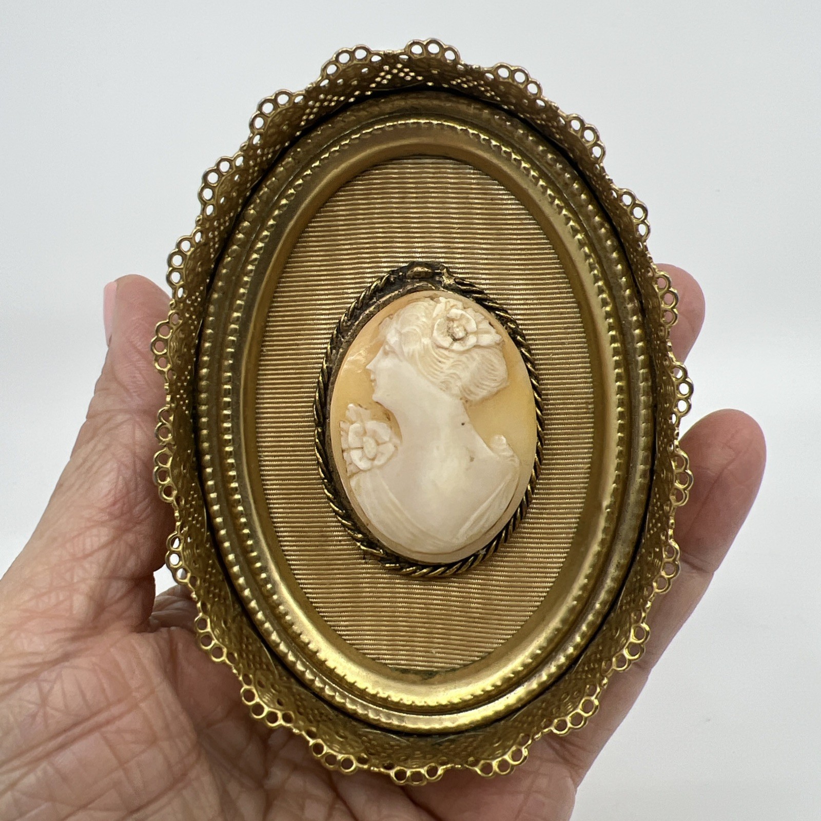 Vintage Oval Shell Cameo Portrait in Brass Ornate Filigree Frame Beige White