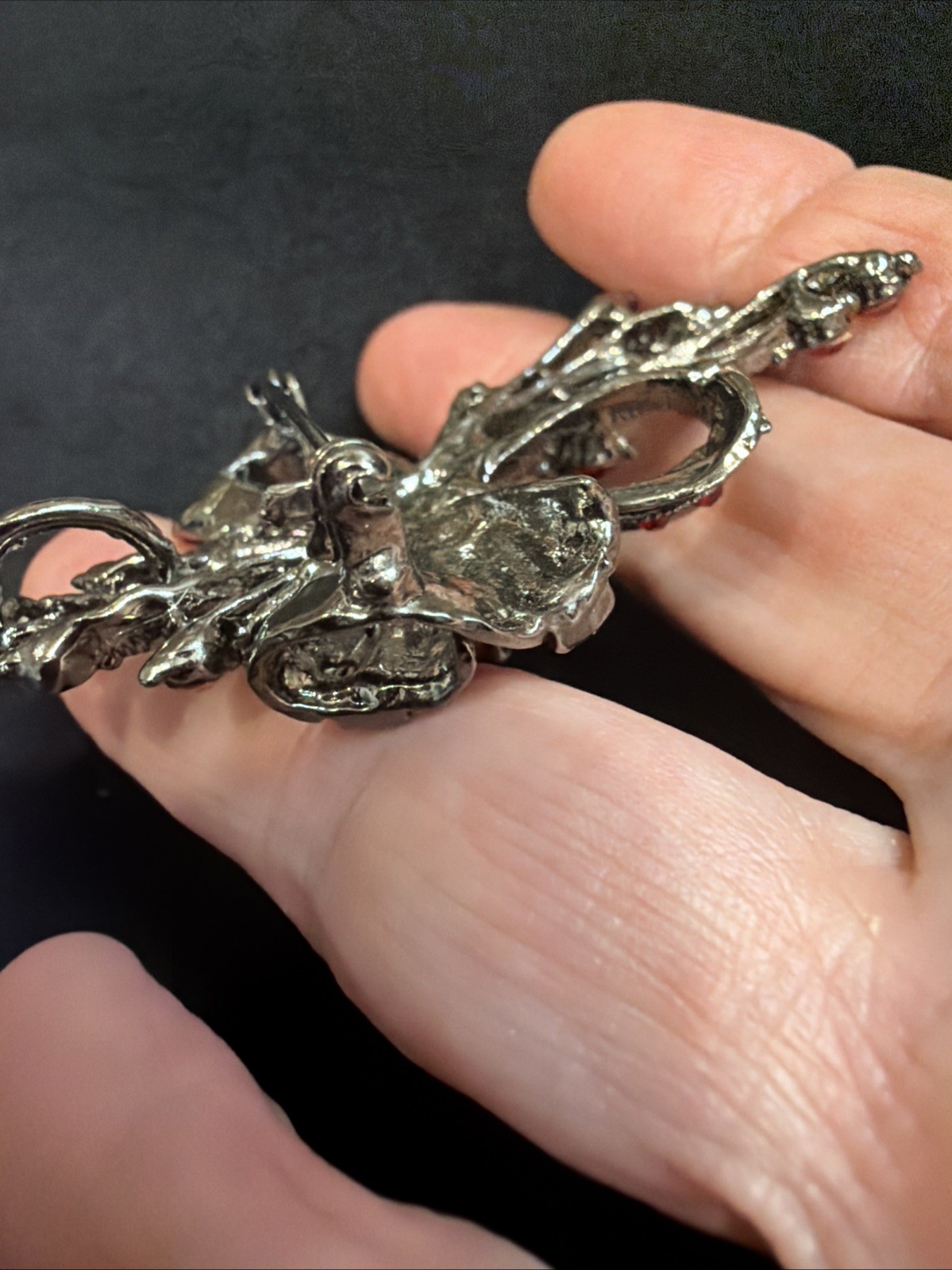 Vintage Bow Brooch Gunmetal-toned With Red Iridescent Rhinestones