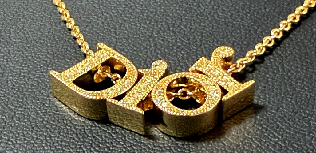 Christian Dior necklace pendant Features the DIOR logo rhinestones gold plating