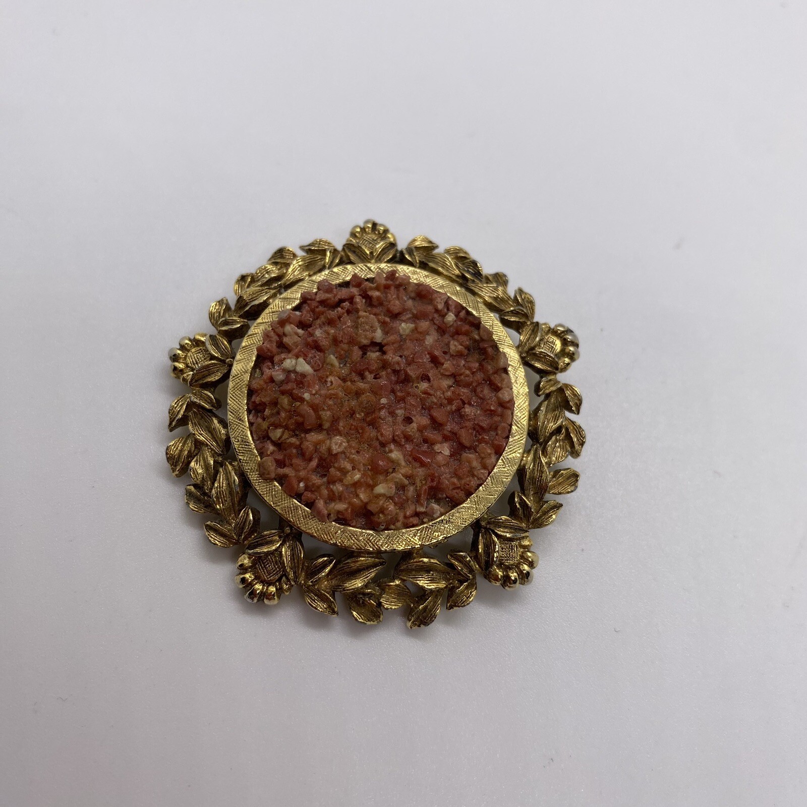 Brooch- Vintage Round Gold Tone Designed Trim With Small Salmon Color Stone Pin
