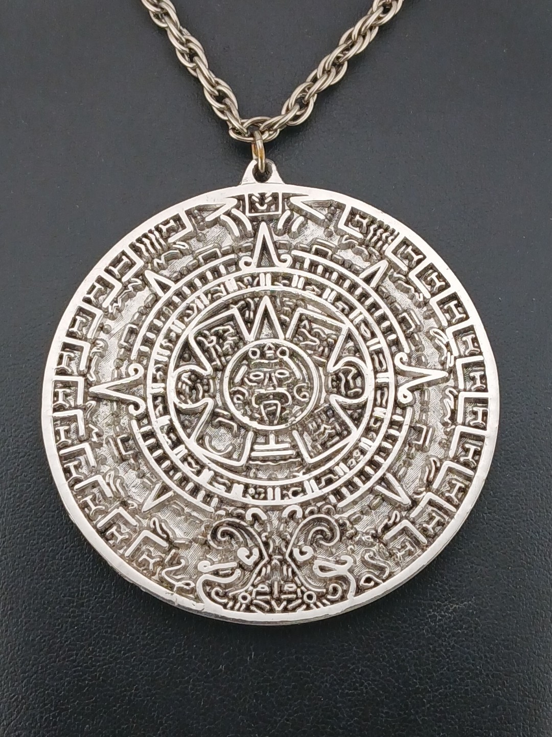 TORTOLINI 1960s silver tone Aztec Calendar textured design medallion necklace