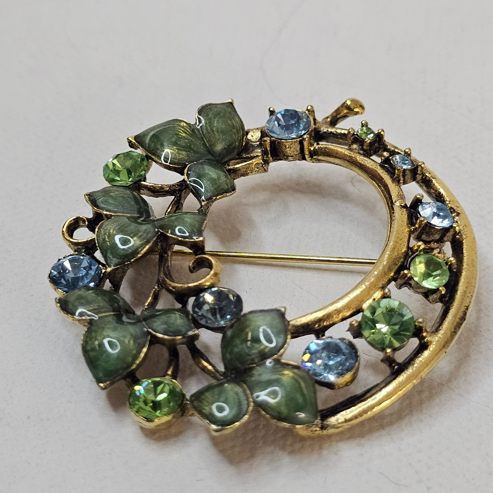 Gold Colored Metal Wreath Brooch Enameled Green Blue Rhinestone Unmarked Pin