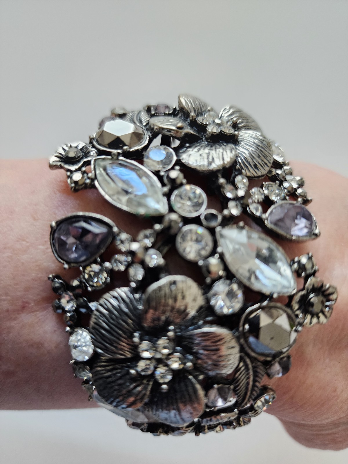 Vtg. rhinestone bracelet, front opening, hinged spring, silver tone metal