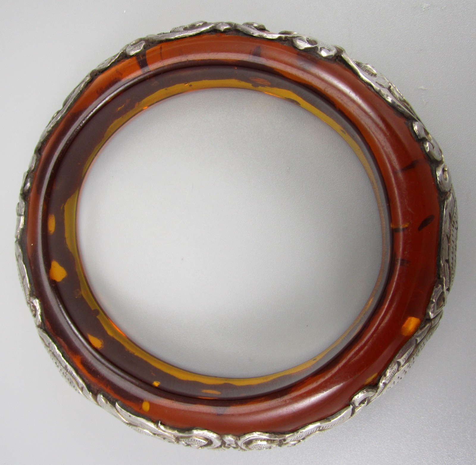 TIBET REPOUSSE STERLING SILVER ON FAUX AMBER RESIN DOUBLE DRAGON BANGLE BRACELET