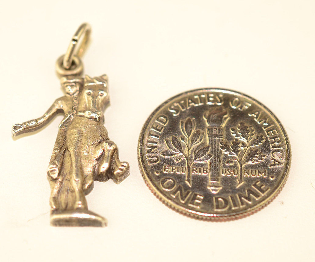 VINTAGE STERLING SILVER PAUL REVERE RIDING ON A HORSE CHARM BY HERALDICS