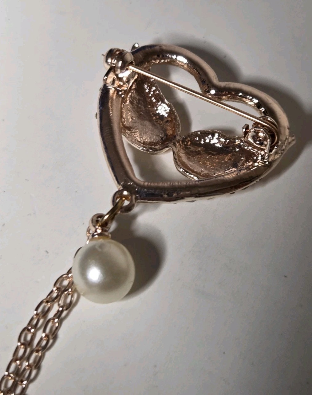White Austrian Cyrstal Brooch In Rosetone With White Glass Pearl Wings Heart