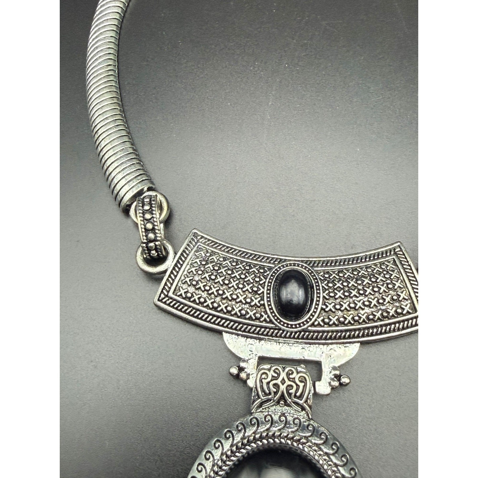 Vintage style silver-tone necklace with black enamel pendant