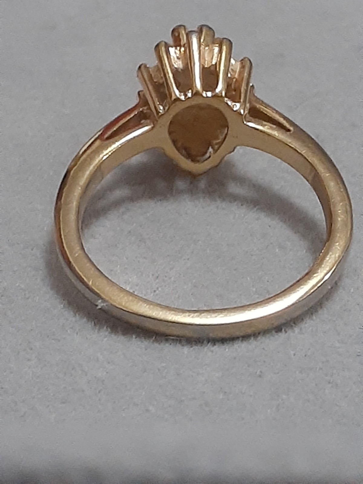18K HGE prong set clear stone cluster ring, rosette, teardrop shape. Size 6