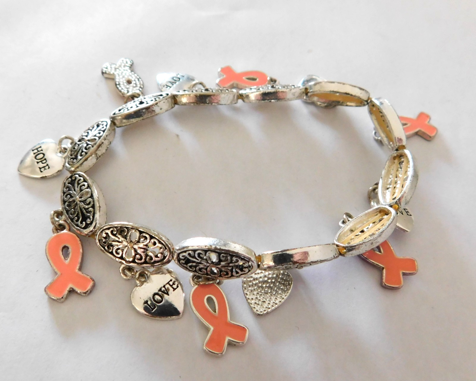 Breast Cancer Awareness Pink Ribbon Silvertone Charm Bracelet
