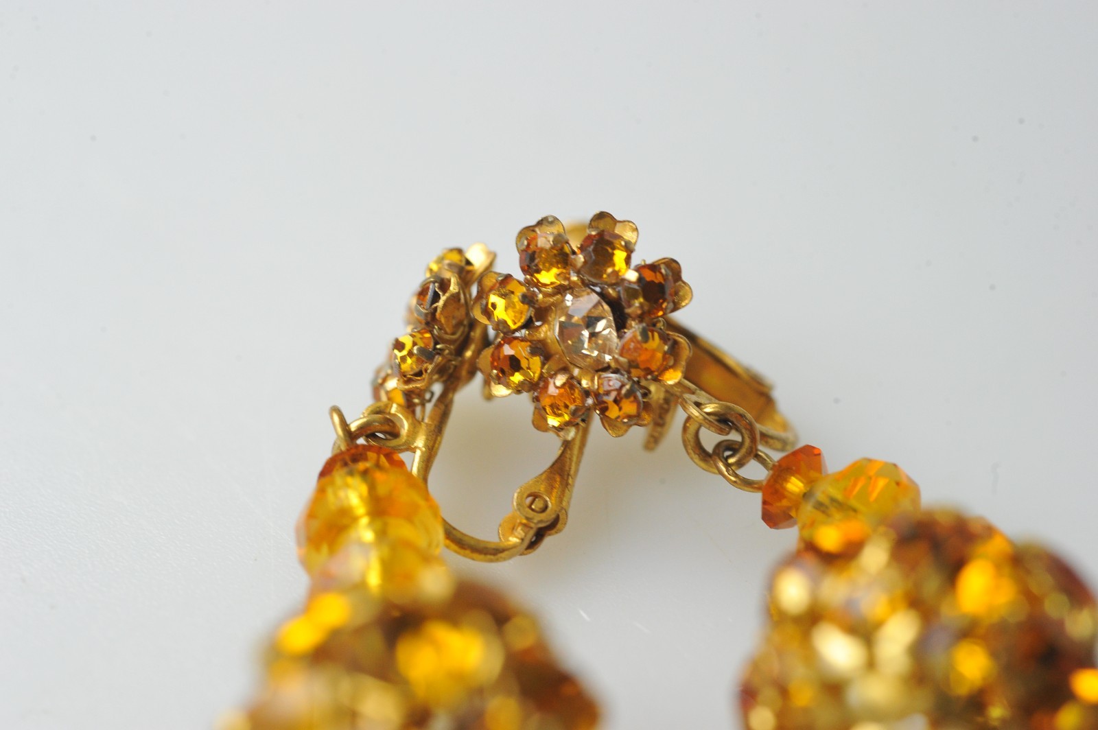 Vtg signed Miriam Haskell rhinestone Gold Tone drop clip earrings amber color