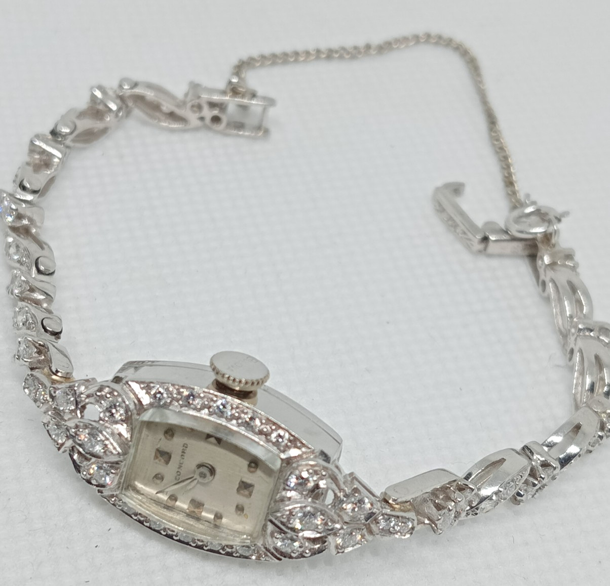 STAMPED IRID PLATINUM MANUAL CONCORD LADIES DIAMOND WRIST WATCH