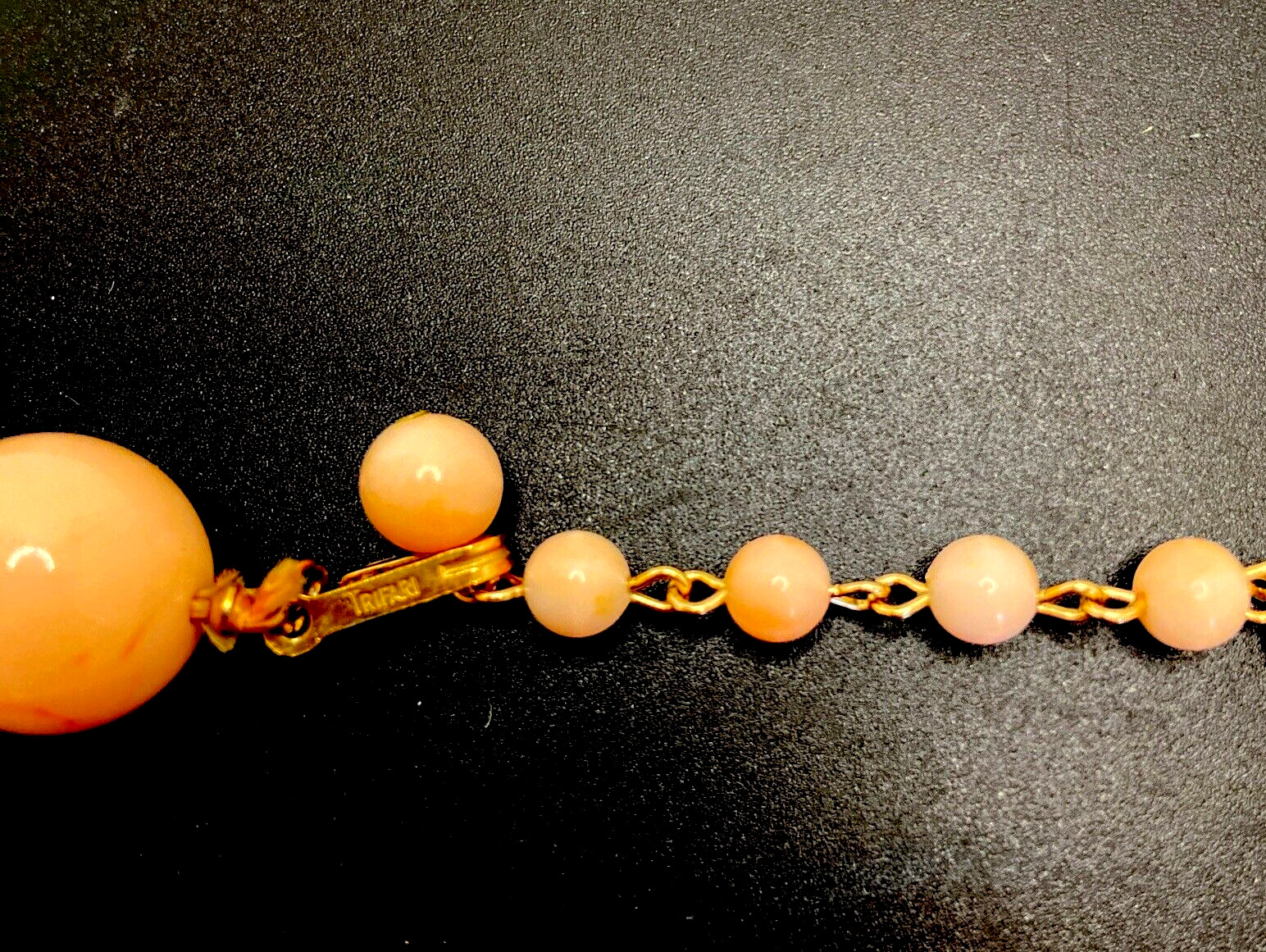 Vintage Trifari light pink swirl plastic bead knotted strand necklace 15”-17”