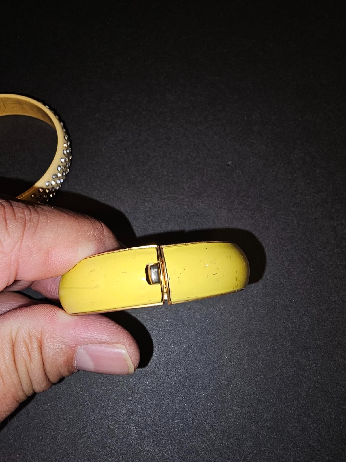 2 vintage bangle bracelets I believe the solid one may be Bakelite but not sure