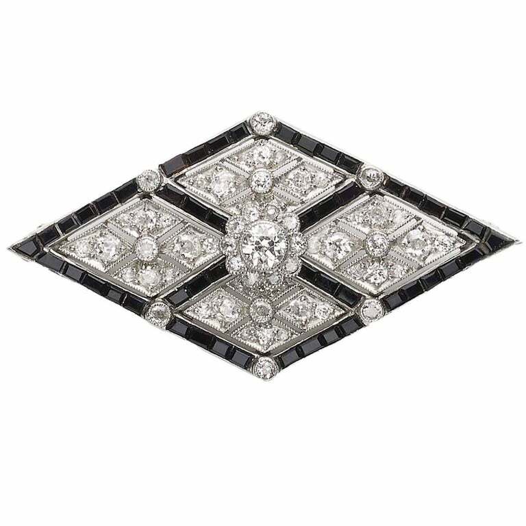 Lozenge Shape With Round Cut Cubic Zirconia & Calibre Cut Onyx Border Brooch