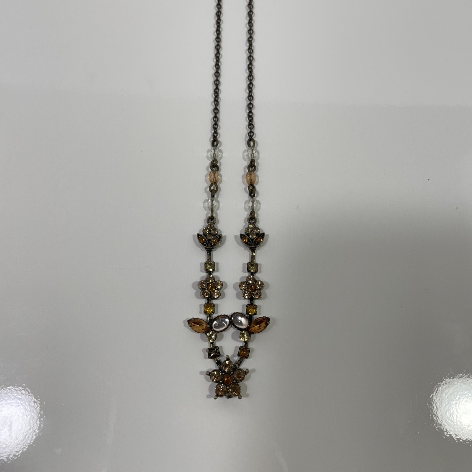 Antiqued Avon brass & topaz rhinestone Flower leaves necklace