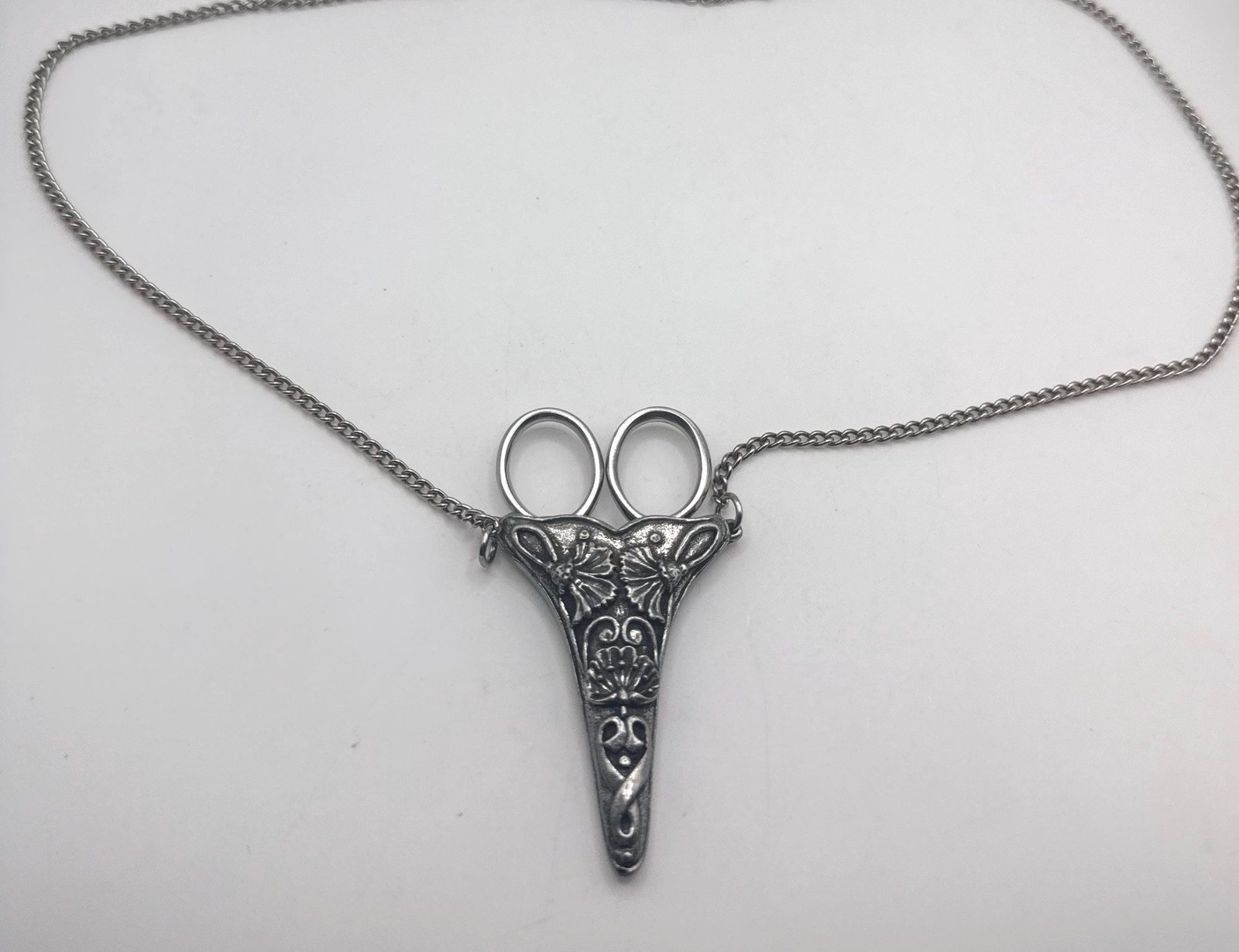 Vintage pewter floral made in England embroidery sewing scissor holder necklace