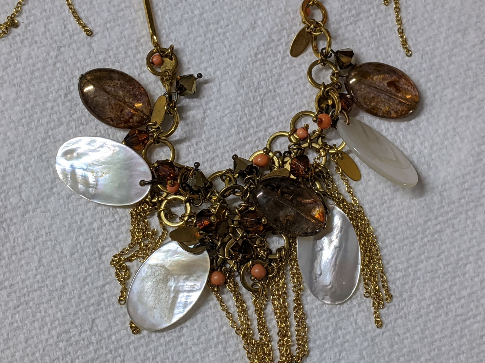 Gold tone mother of pearl, earring and necklace set peach, brown beads, China