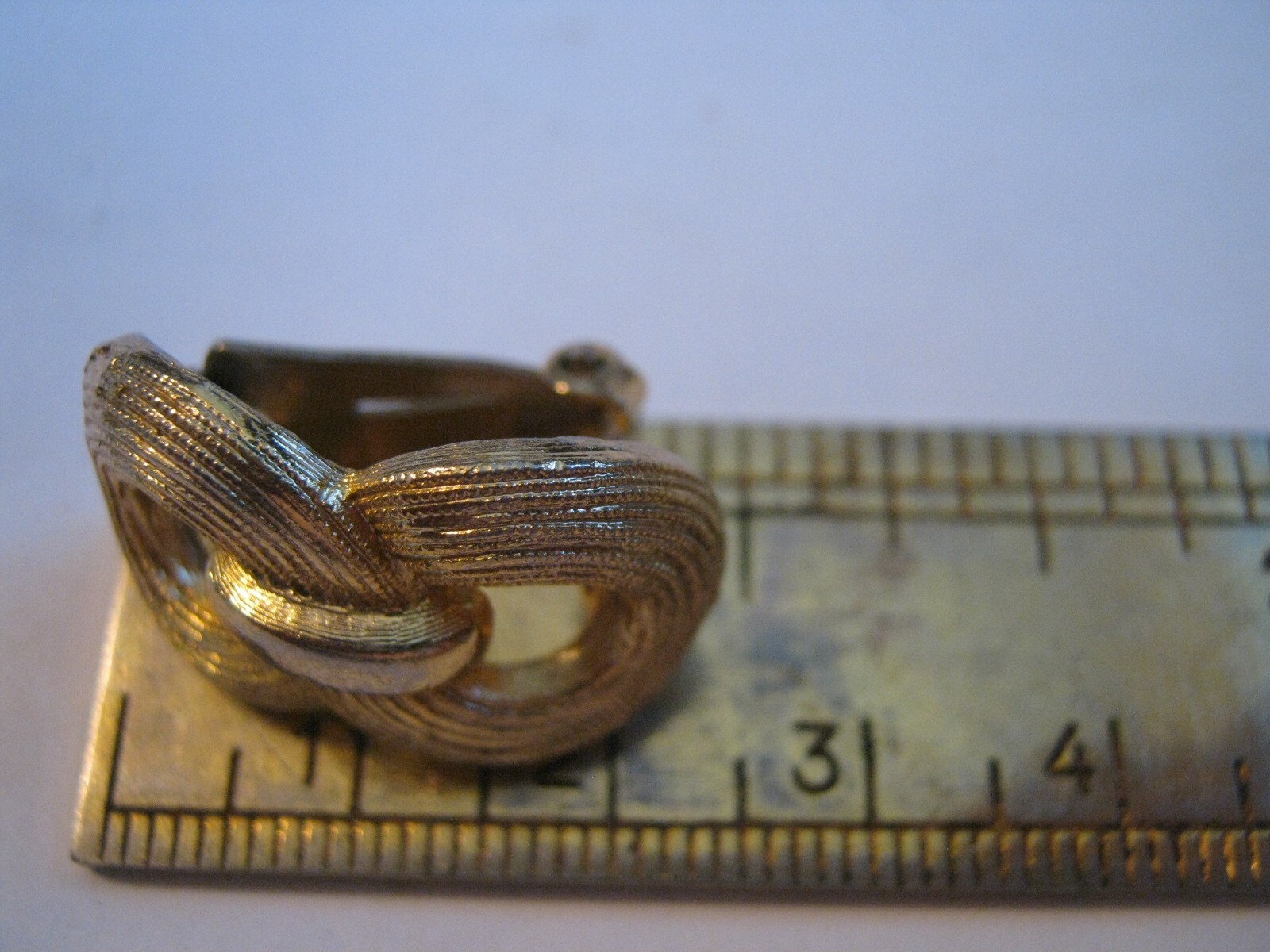 ORENA Paris (1977-2005) Golden Textured Figure 8 Knot 1″ Clip-On Earrings