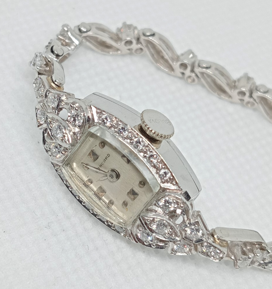 STAMPED IRID PLATINUM MANUAL CONCORD LADIES DIAMOND WRIST WATCH