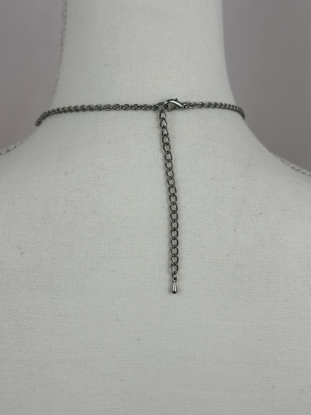 PENDANT MCM WHITE BLACK ENAMEL SWIRL DESIGN SILVER TONE CHAIN NECKLACE