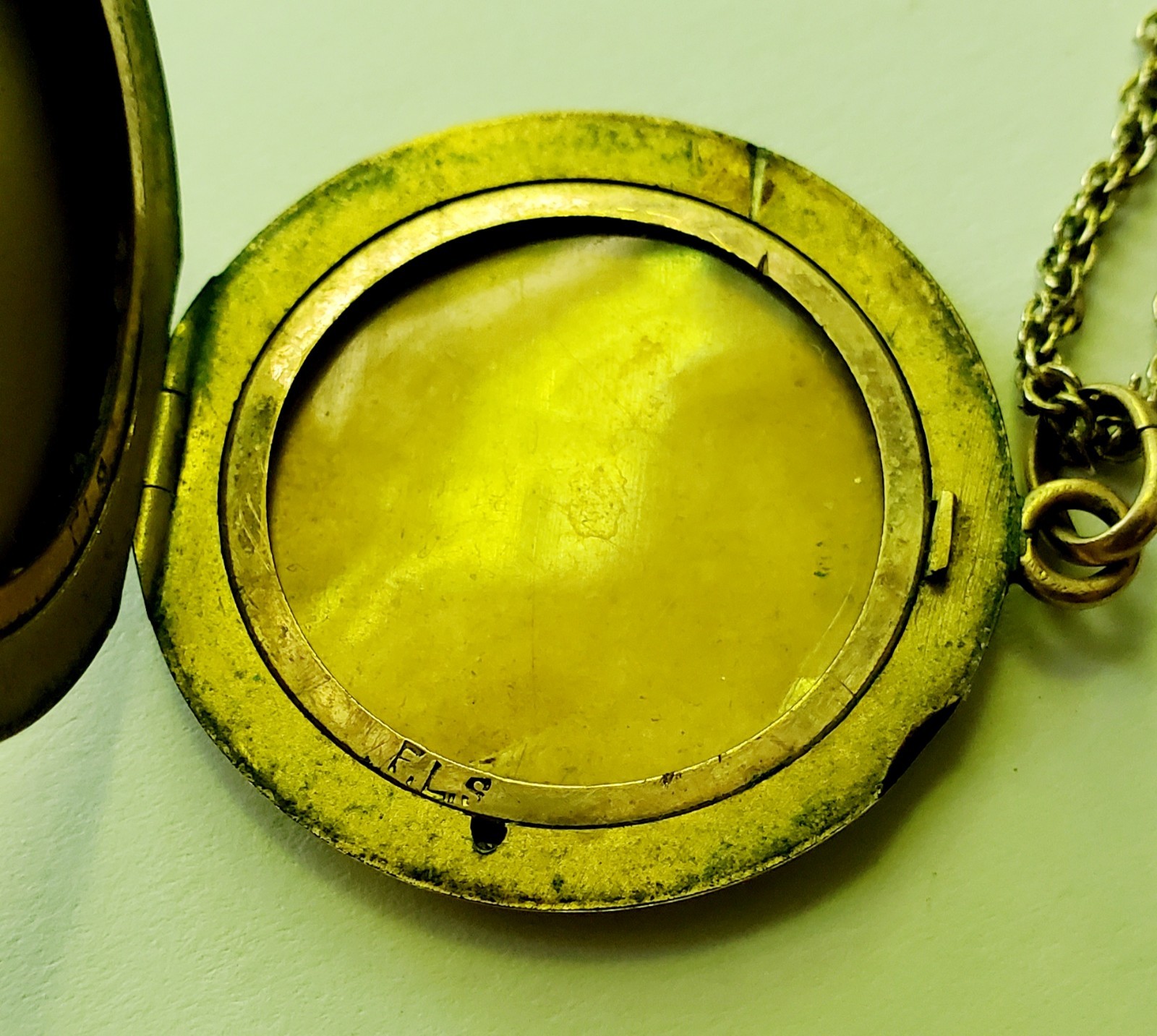 Antique gold tone etched/monogrammed locket pendant necklace stamped F.L.S.