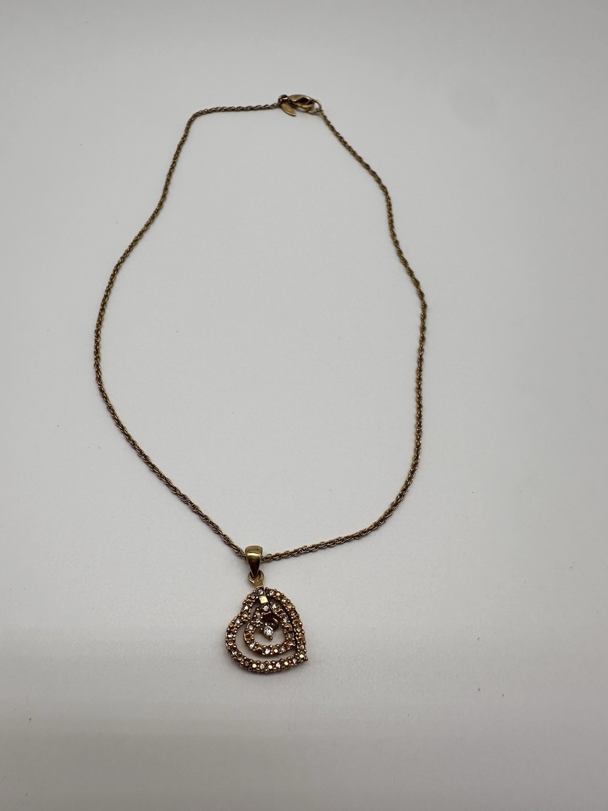 Avon Triple Heart Pendant Gold Tone And CZ Chain Necklace Graduated Open Hearts