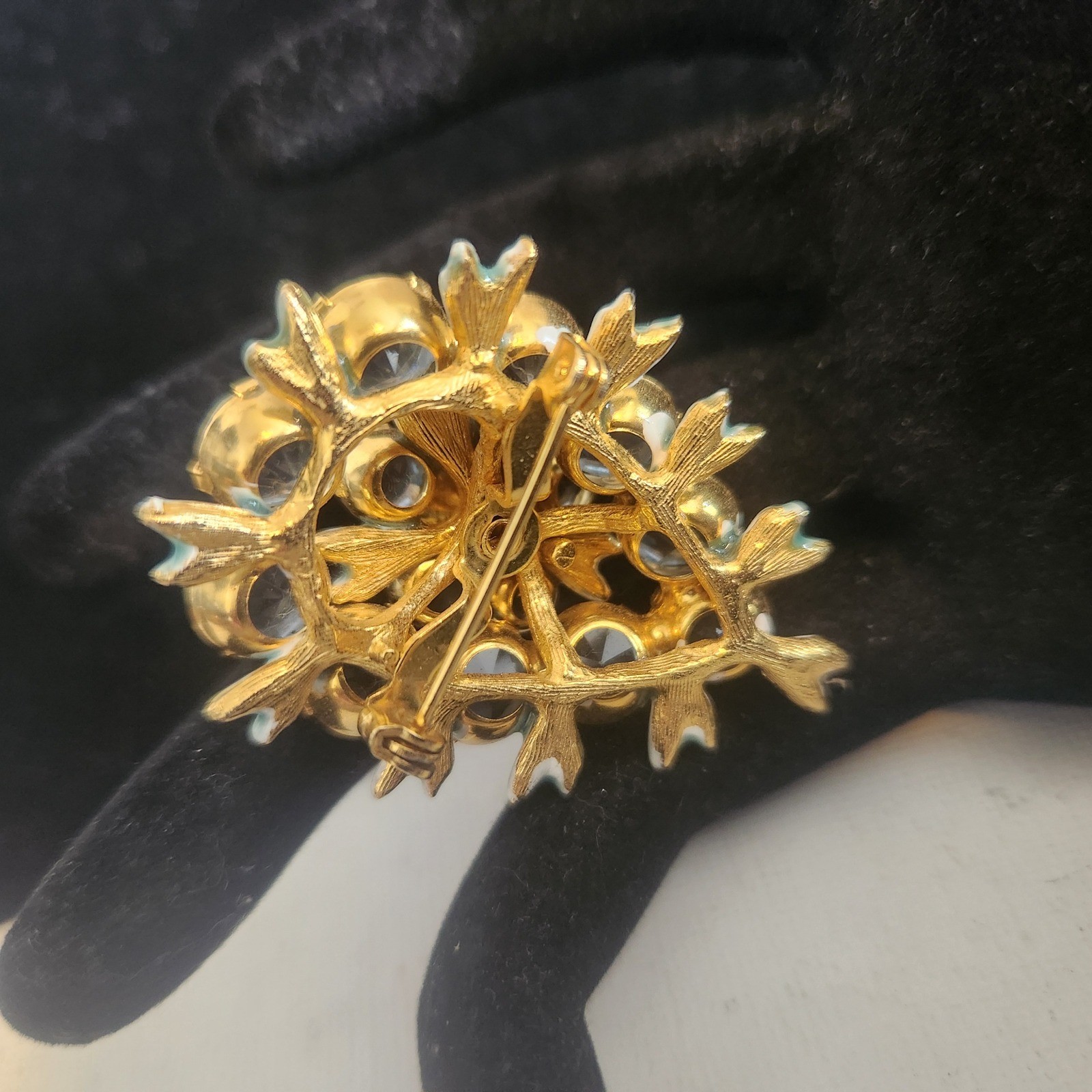 Vintage Light Blue Rhinestone Floral Cluster brooch Gold Tone Enamel Leaf Detail